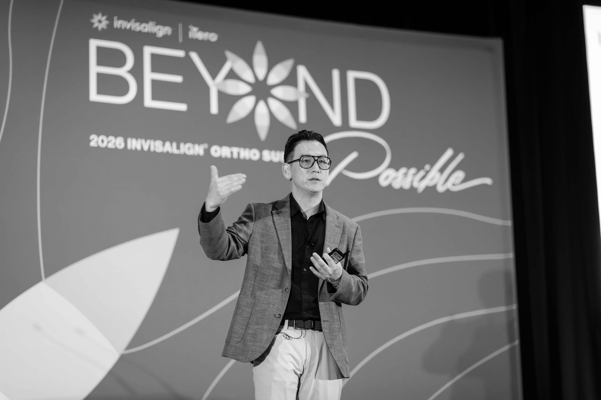 Dr. Sam Lee on stage at the 2026 Invisalign Ortho Summit